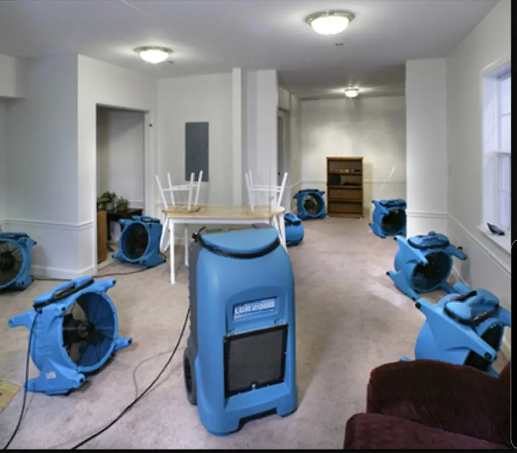 Air movers and dehumidifier setup for Water Damage Restoration in Montvale
